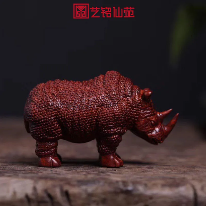 Small leaf red sandalwood rhinoceros playing hand pieces men's Handmade original wood carving portable old mahogany ornaments