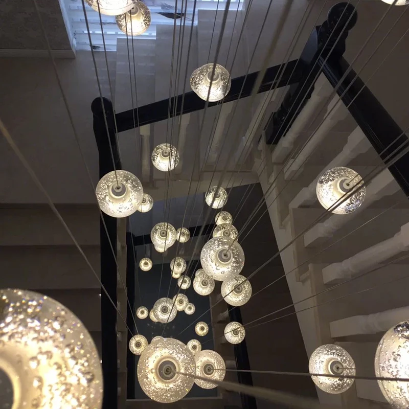 Crystal chandelier Rotating stair lamp Long chandelier Nordic Modern Loft Hotel decorated with large lights