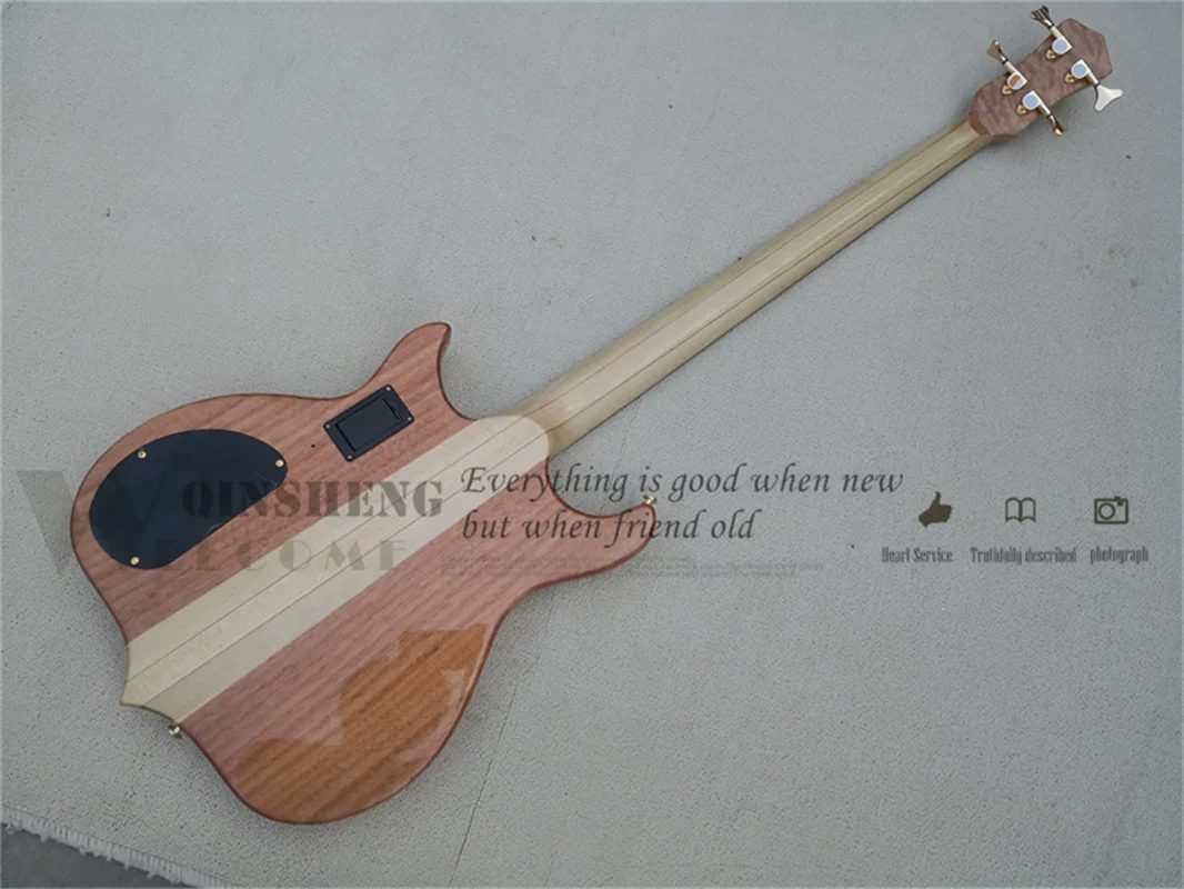 Custom 4 string bass guitar brown squilted maple veneer,mahogany body,gold buttons,active battery