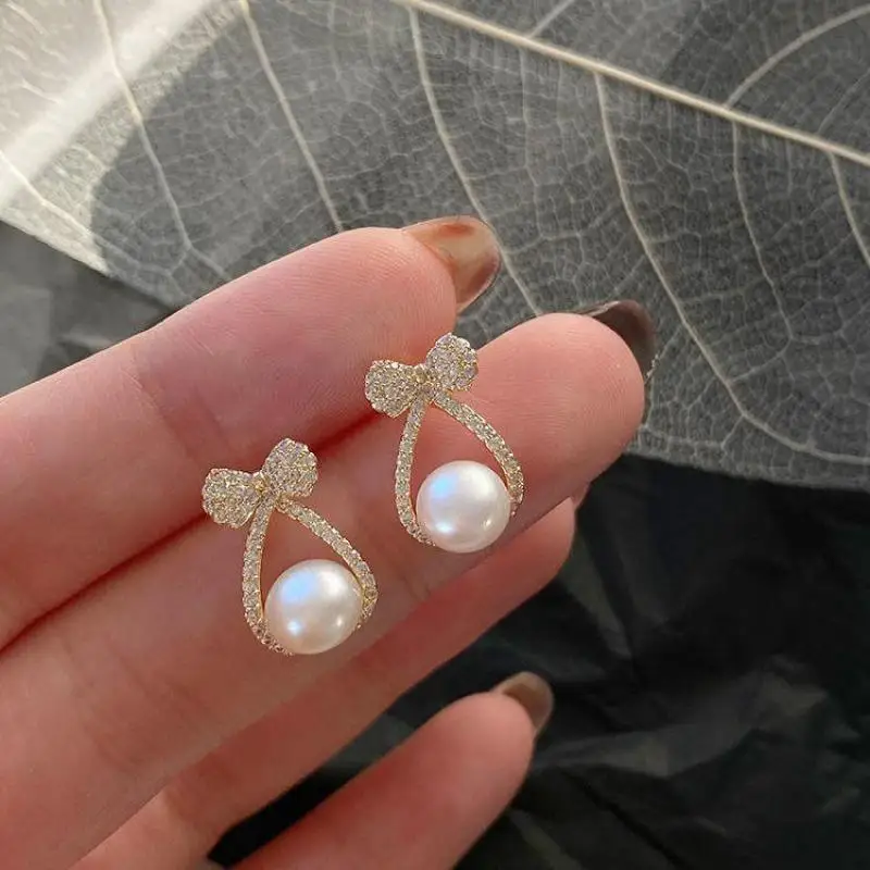 2021 Fashion New Temperament Earrings, Small Bow, Pearl Crystal Earrings, Net Celebrity All-match Manufacturer Sales Earrings