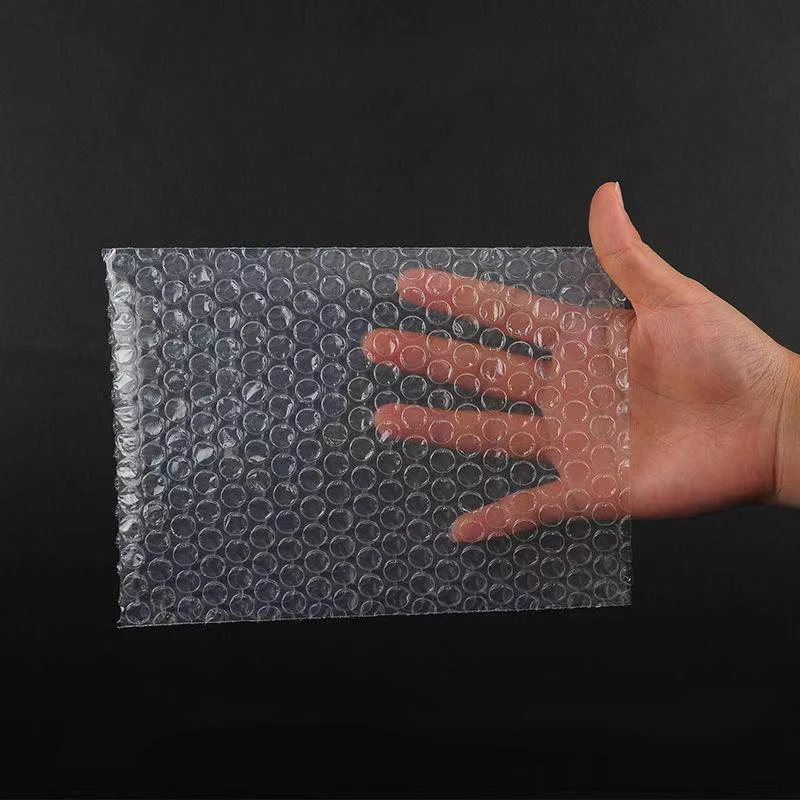 Bolsa de burbujas transparente de 100 piezas, sobre acolchado a prueba de golpes, envío pequeño, bolsas de correo para cosméticos/Embalaje de maquillaje, correo de burbujas