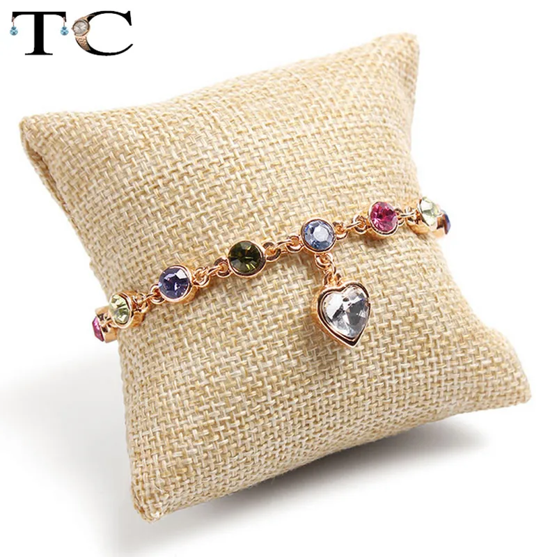 

Fabric Small Pillow Cushion Bracelet Bangle Wrist Watch Jewelry Display Holder Showcase Watch Pillow Jewelry Display Stand