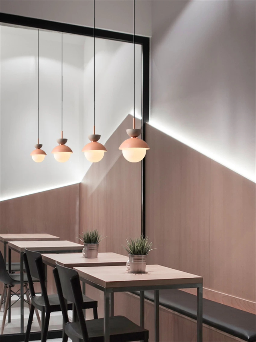 شخصية شبه مستديرة الحديد قلادة LED أضواء الشمال الحديثة الحد الأدنى الإبداعية مطعم غرفة نوم معكرون معلقة مصابيح