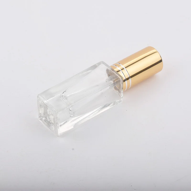 Botella de vidrio transparente con pulverizador, viales de vidrio Para muestra, atomizador de Perfume, tapa dorada, plateada y negra, 3ml, 5ml,