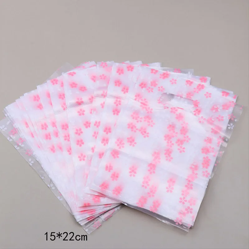 500pcs Cherry Blossom Shopping Bag Sakura Flower Plastic Gift Bag with Handle for Snack Candy Cookies Wrappers