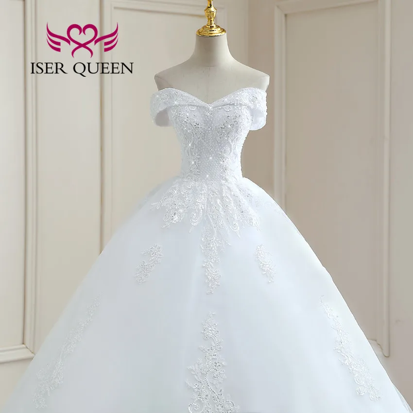 คริสตัลลูกปัดลูกไม้ที่กําหนดเองเจ้าหญิงงานแต่งงานชุดหมวกแขน Appliques Chapel Train ชุดแต่งงาน WX0261