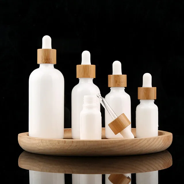 

dropper bottle wholesale 100/pcs 10ml 15ml 20ml 30ml 50ml 100ml porcelain white glass with bamboo lid parfume bottle refillable