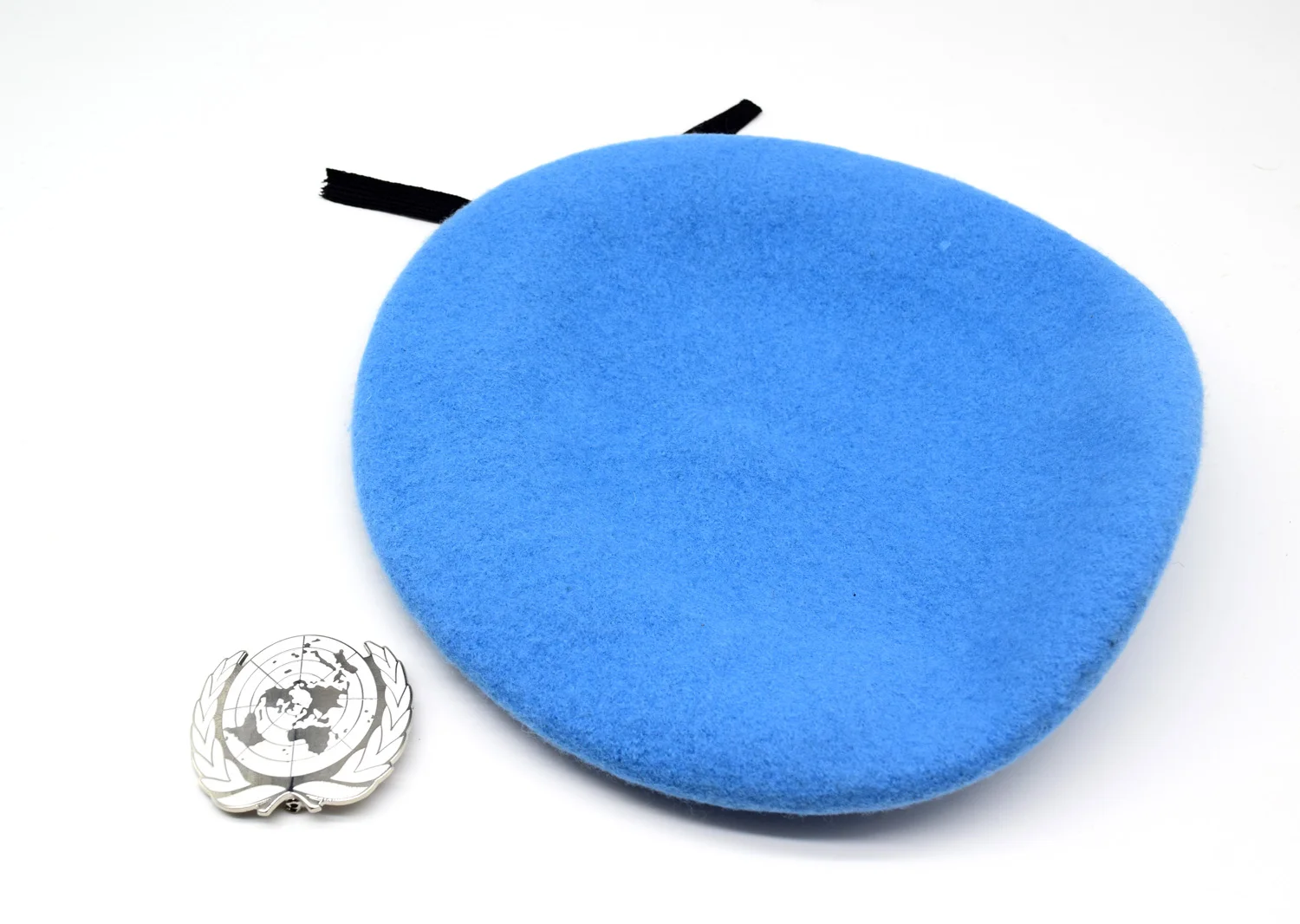 قبعة صوفية قابلة للجمع من قوات حفظ السلام من الأمم المتحدة UN BLUE BERET W UN Siliver Badge