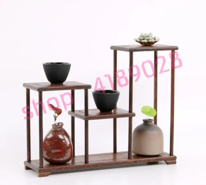 

Natural chicken wing wood, medium low (medium size), solid wood curio shelves, tea ceremony ornaments pendulum rack.