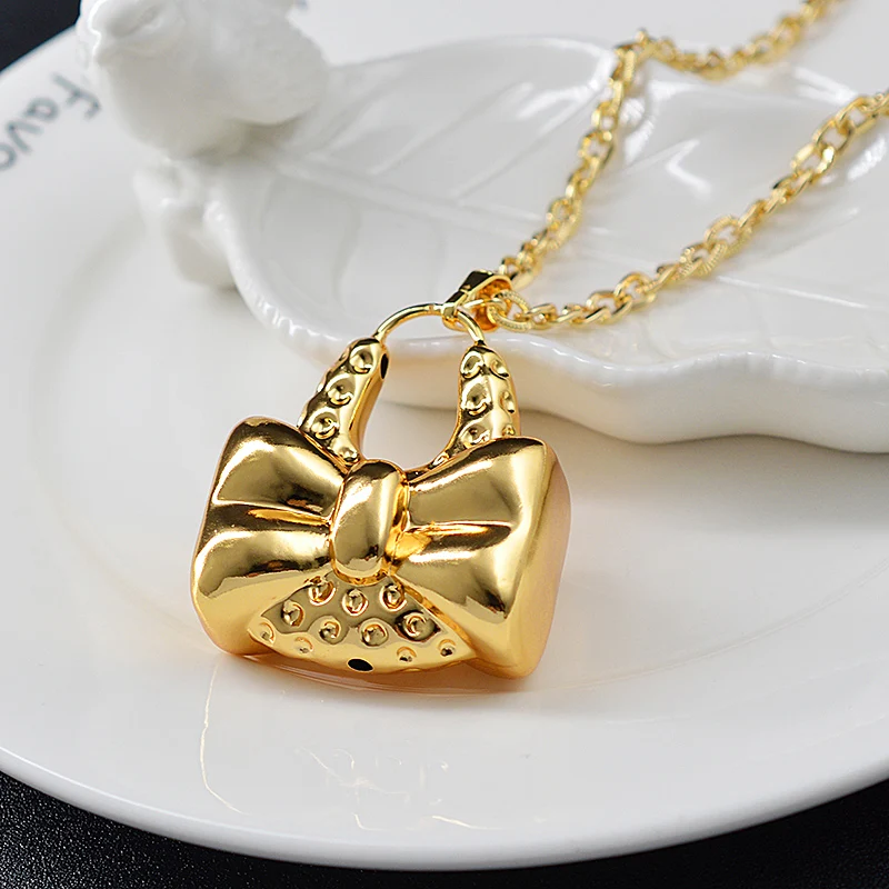 Sunny Jewelry Fashion Jewelry Copper Jewelry Sets For Women Dubai New Design Bowknot Necklace Earrings Pendant Hoop Earrings