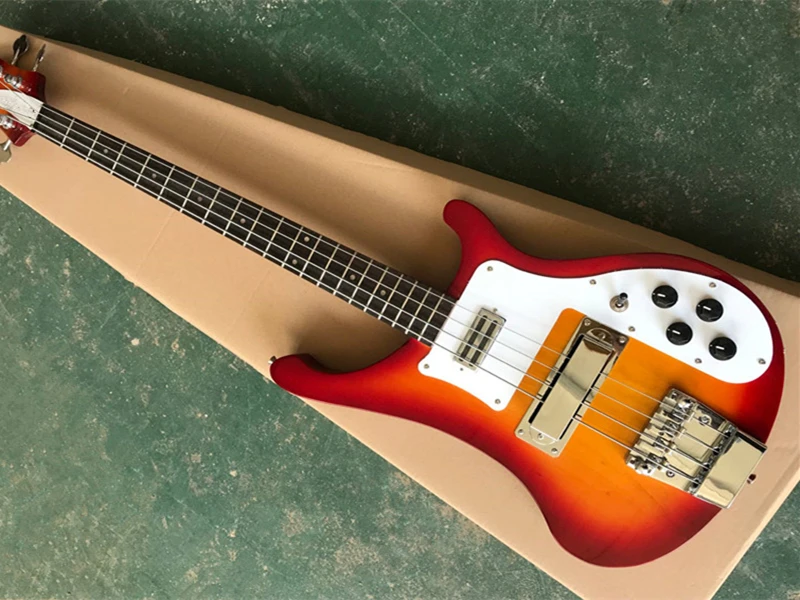 Orange color 4 strings Electric Bass Guitar with White Pickguard,Rosewood Fingerboard,Chrome Hardware,Provide custom service