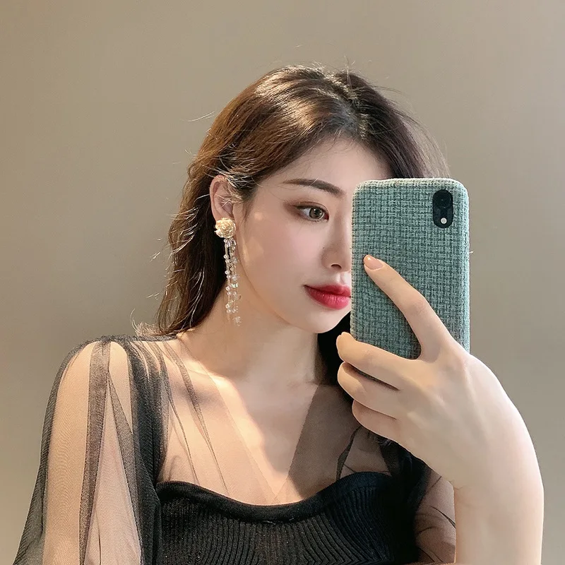 The new arrival of the palace style exaggerated flower tassel earrings fashion sense of high-level statement earrings for women