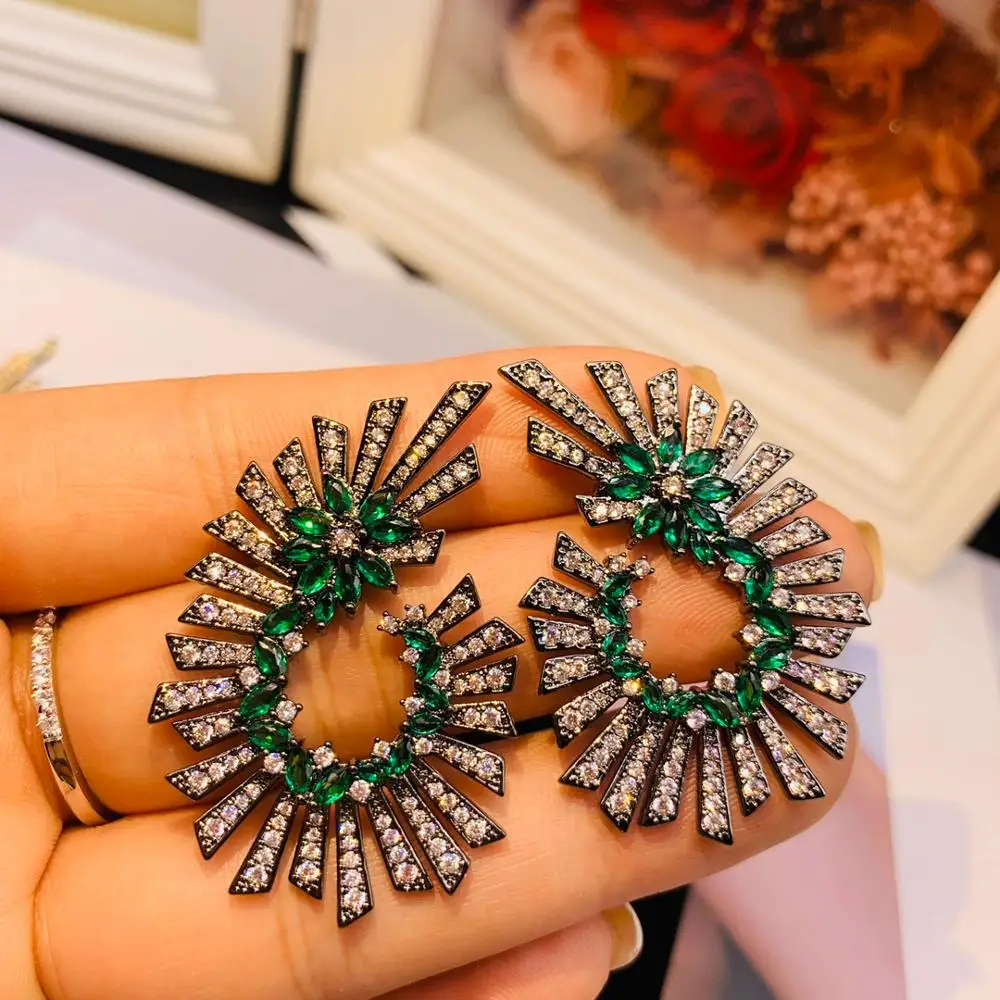 

Hibride New hot Fashion Popular Luxury Crystal Zircon Stud Earrings Spark Shape Flower Earrings Fashion Jewelry for Women E-559