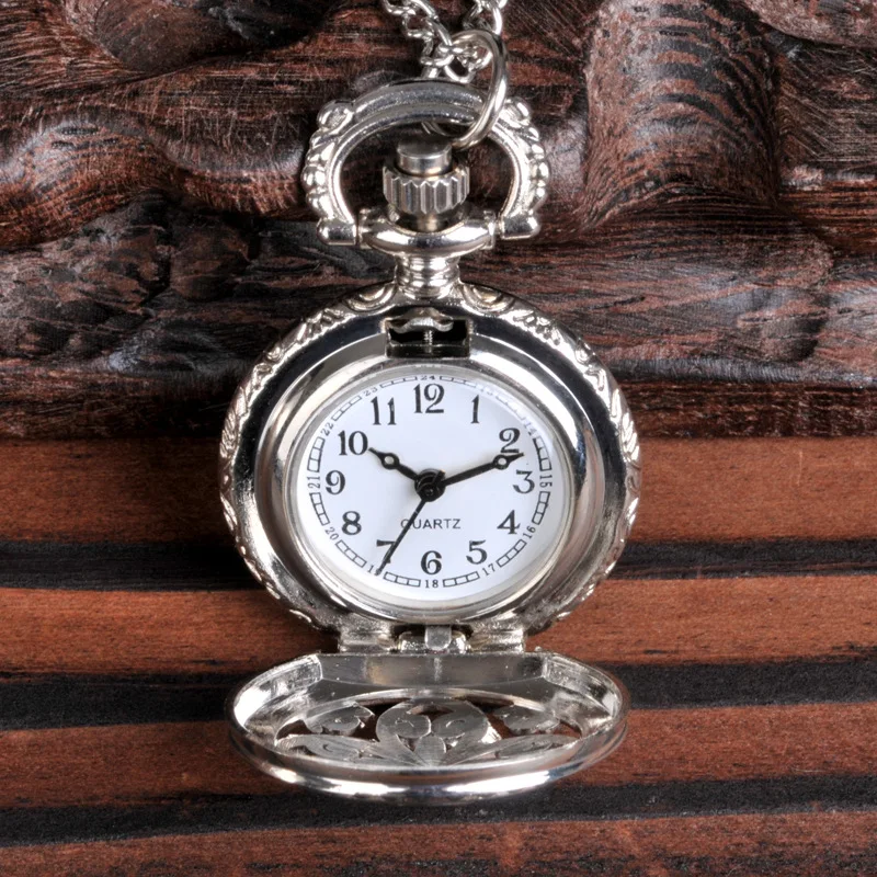 Small silver four-petal hollow quartz pocket watch
