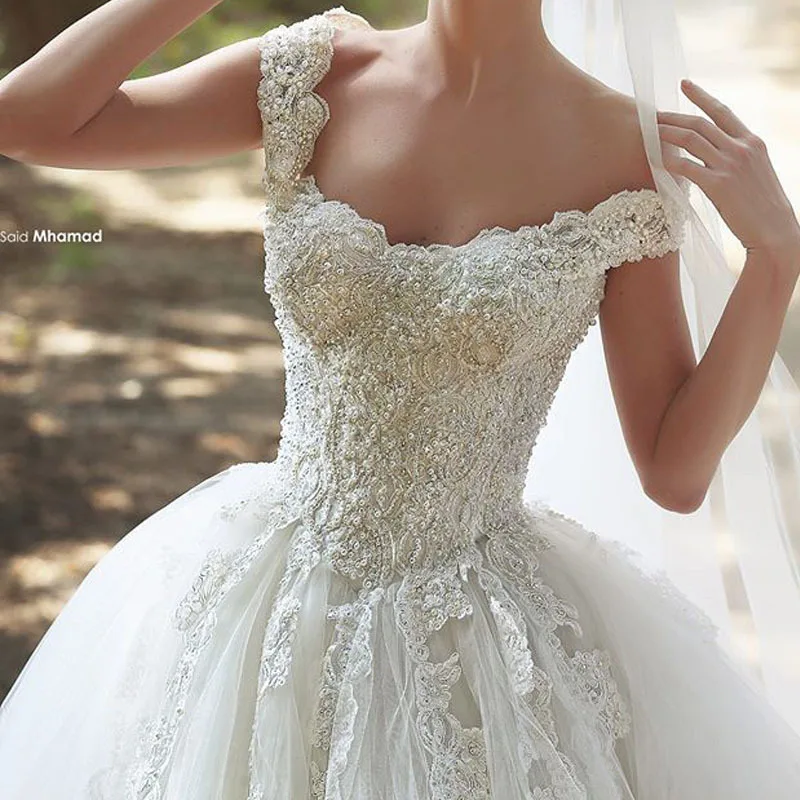 2015 Designer Said Elegant Appliqued Beaded Pearls Bling Bling Bodice Floor Length Puffy Princess Wedding Dresses