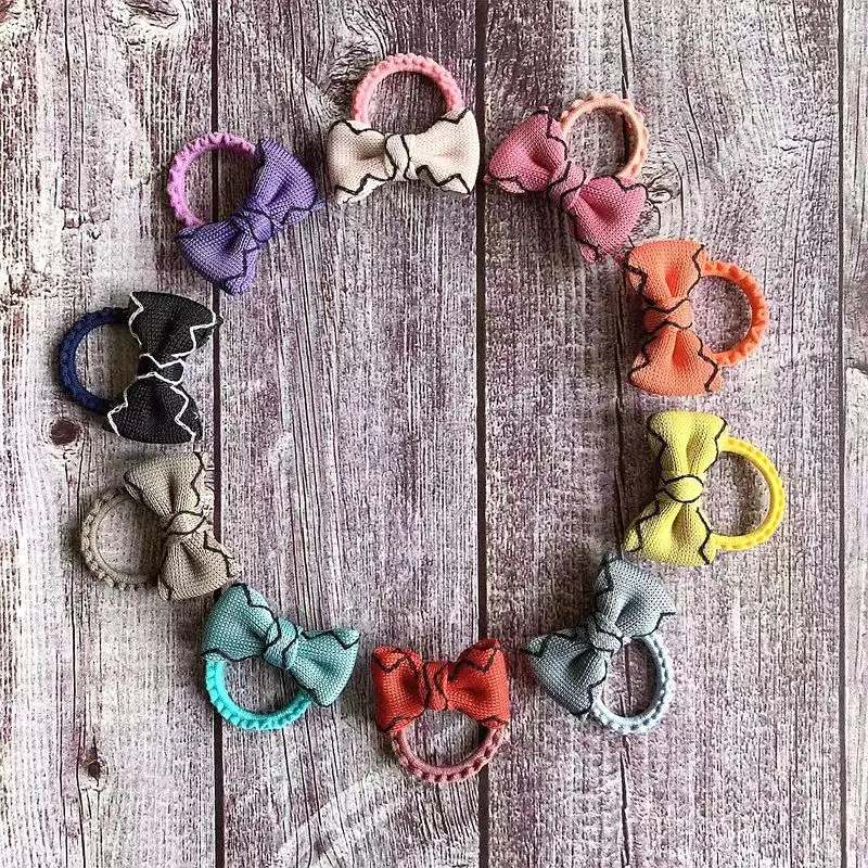 

Wholesale 50pcs Fashion Cute Bow Hair Ties Mini Bowknot Elastic Hair Bands Princess Headwear Girls Hair Accessories