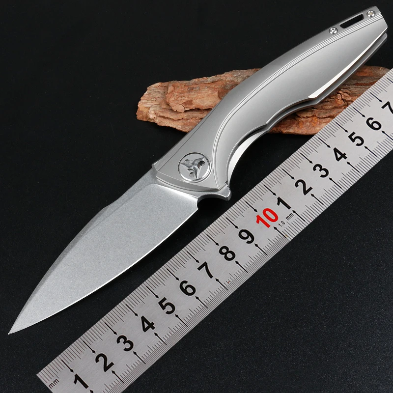 Free shipping The sharp D2 steel folding knife hardness 60 HRC titanium alloy Handle Outdoor camping and fishing EDC tool knife