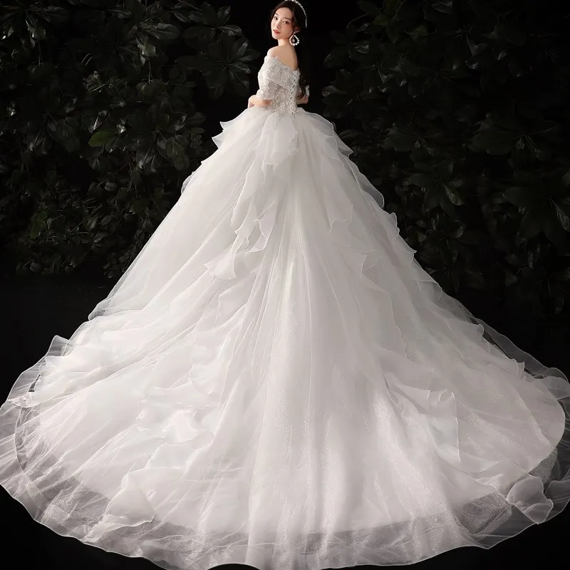 Abito da sposa di lusso fatto a mano elegante scollo a barchetta mezza manica abito da ballo pizzo fiore perline Vestido De Noiva Plus Size su misura