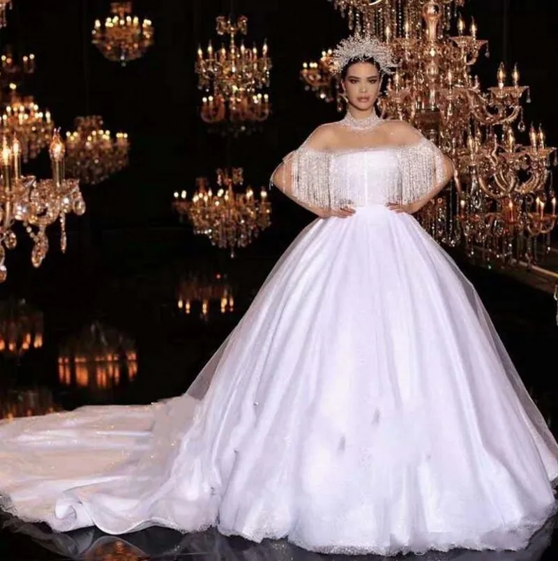 Abiti da sposa di lusso con paillettes scintillanti a collo alto con nappe abito da sposa Vintage con illusione di Dubai arabo saudita