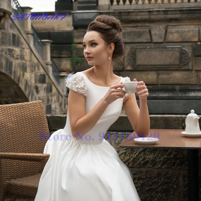 Vestidos De Bride yeni kısa saten düğün elbisesi için gelin Cap Sleeve Backless A-Line gelin kıyafeti fransa Robe marionline Online alışveriş