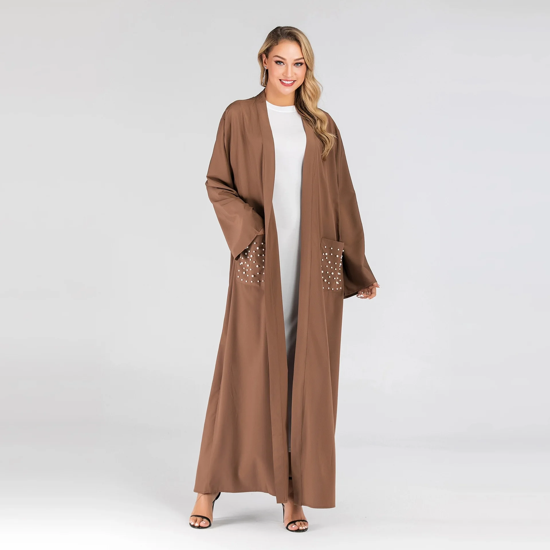 

Dubai Muslim abaya modern dignified and fashionable Islamic clothing robe with pearl pockets on the chest dress