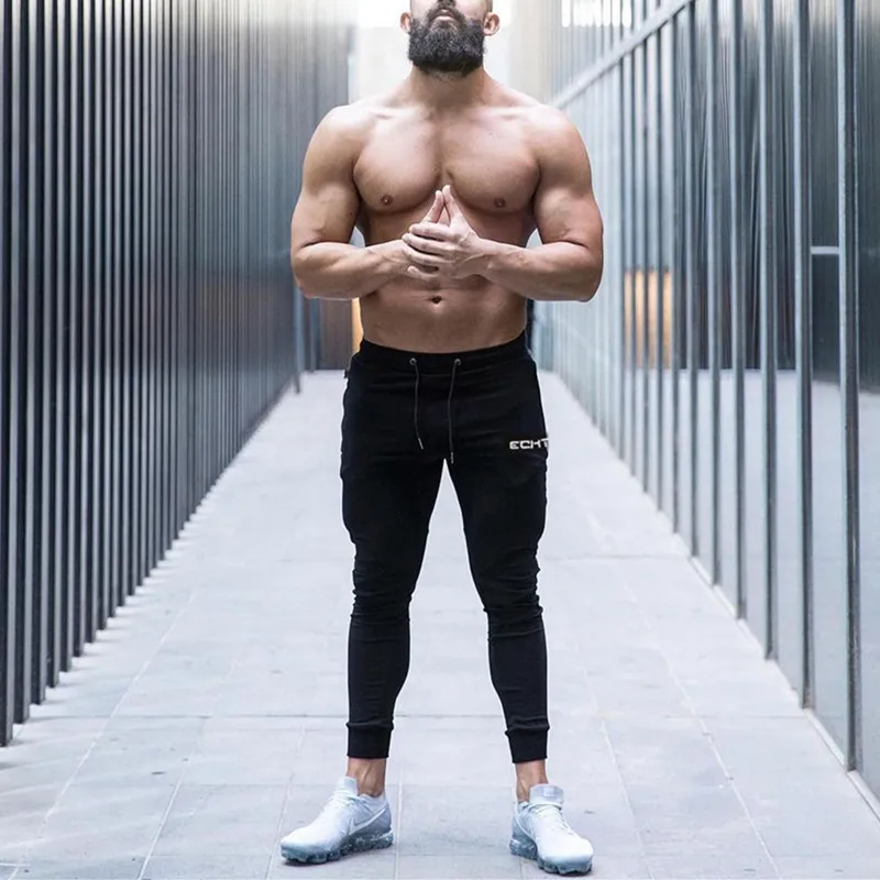 Pantaloni da Jogging Skinny da palestra pantaloni da corsa da uomo pantaloni sportivi da Bodybuilding Fitness tasca con Zip pantaloni da Jogging in