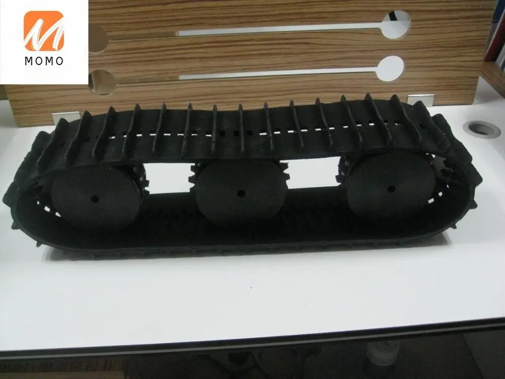 Grass mower rubber track