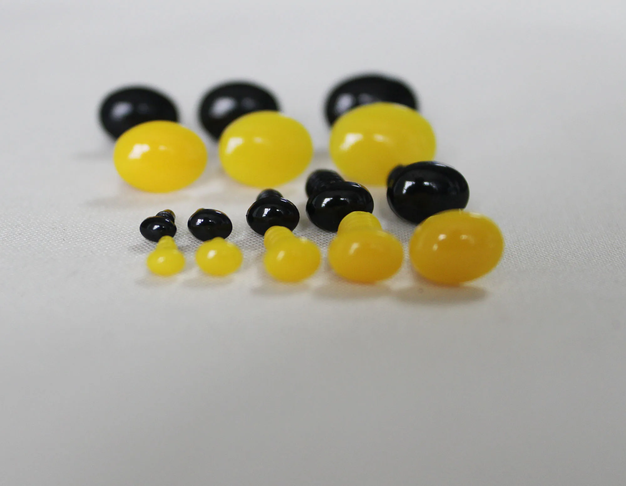 

50pcs/lot 4.5MM 5.5MM 6.5MM 8MM 10MM 12MM 13MM 15MM oval yellow/black plastic toy nose with washer--size option