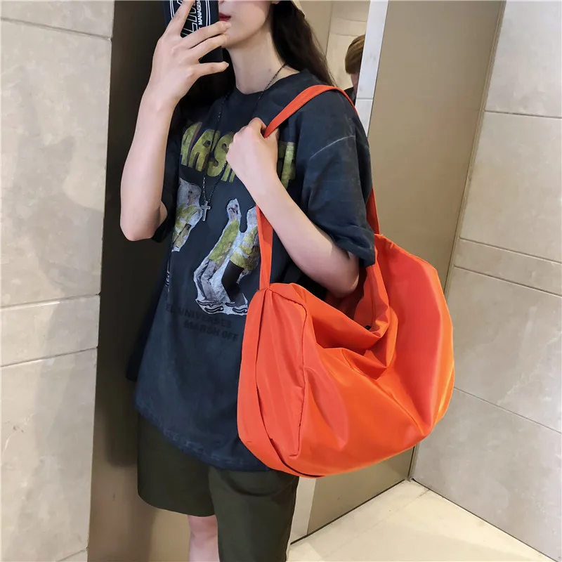 

Sports style Oxford cloth bag women's bag 2021 new solid color simple slung shoulder bag large-capacity portable bag