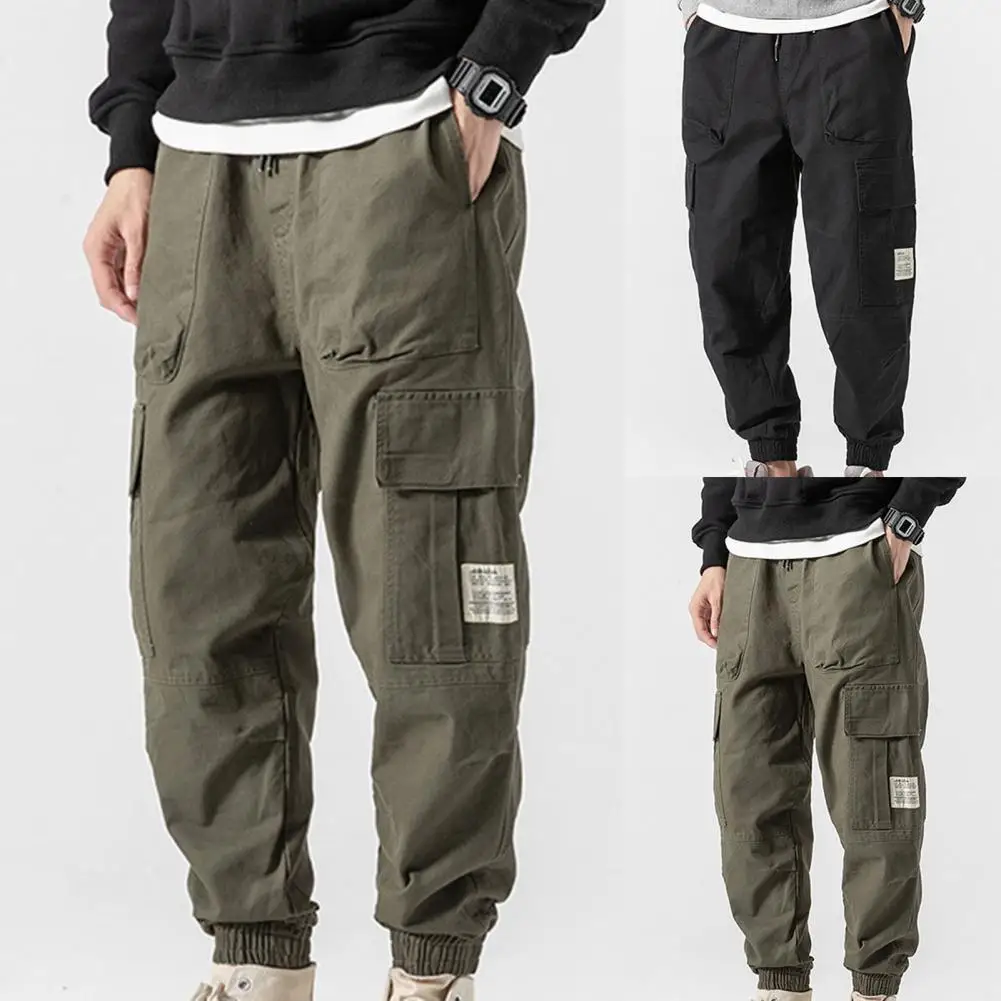 2021 fashion solid color skin-friendly multi-pocket men drawstring trousers mid-waist drawstring pants street daily casual wear