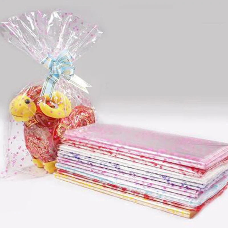 Bolsa de plástico transparente para muñecas, paquete de celofán transparente, suministros de panadería, decoración para fiestas en casa, amor colorido, 20 piezas