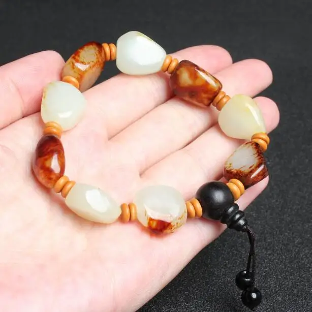 Natural Xinjiang Hetian jade belt skin seed stone hand string transfer Pearl Zhaocai transfer jade BRACELET