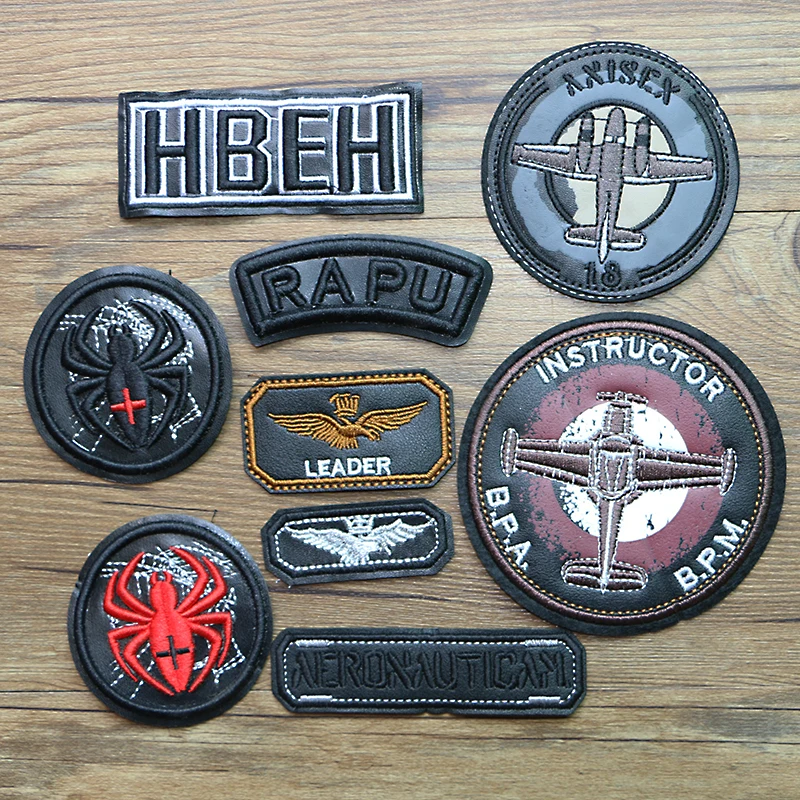Parches de apliques bordados de cuero Pu con icono redondo para ropa, insignia de coser DIY en la mochila, avión, águila, Araña, letras