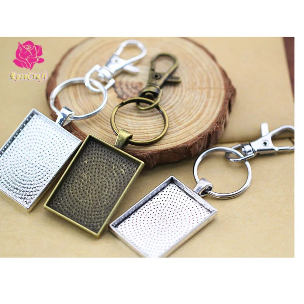 

10pcs Zinc Alloy 25x35mm Blank Pendant Keychain Rectangle Base Tray+25mm Key Ring+25x35mm Glass Cabochon+Lobster Clasps