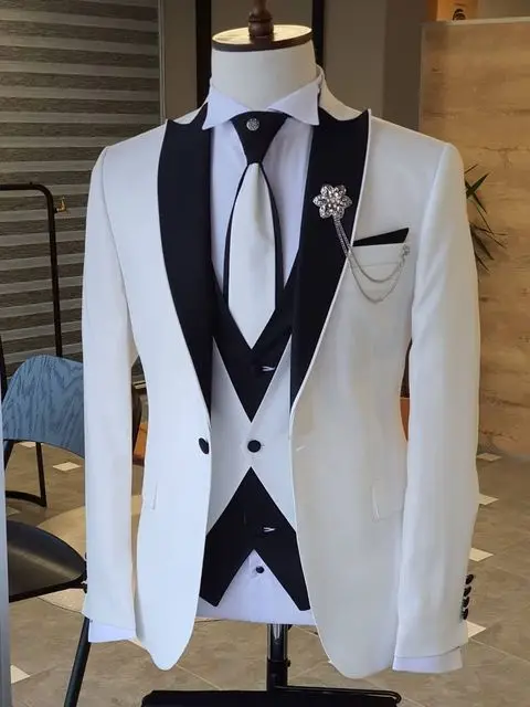 Latest Design White Costume Homme Men Suits Black Peak Lapel Wedding Tuxedo Prom Groom 3 Piece Slim Fit Blazer Vest Pants