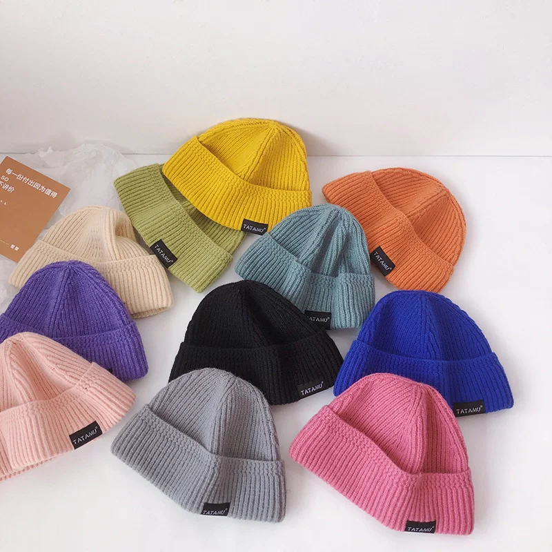 Ins children's wool hat autumn and winter solid color label knitted hat thickened warm pullover hat versatile hat fashion