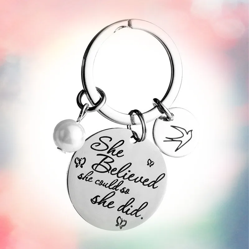 keychain round stainless steel pendant with the words 