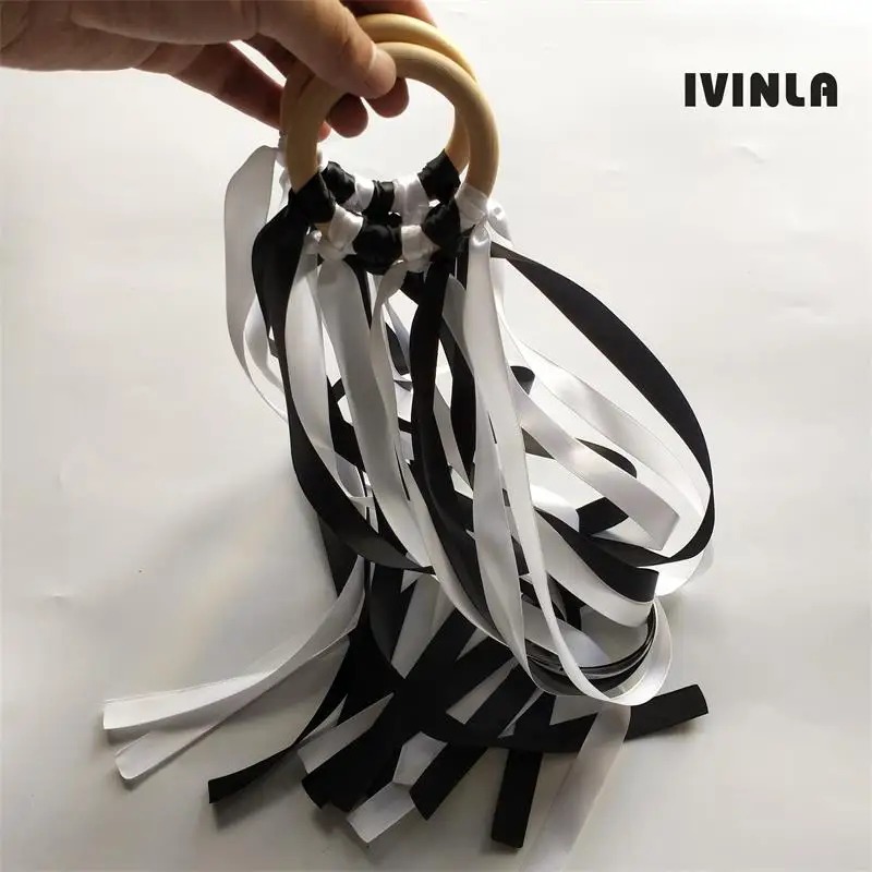 20pcs/lot black and white  Wooden Ring Waldorf Ribbon With Bell Hand Kite Toy FLY ME Birthyday Party Favors