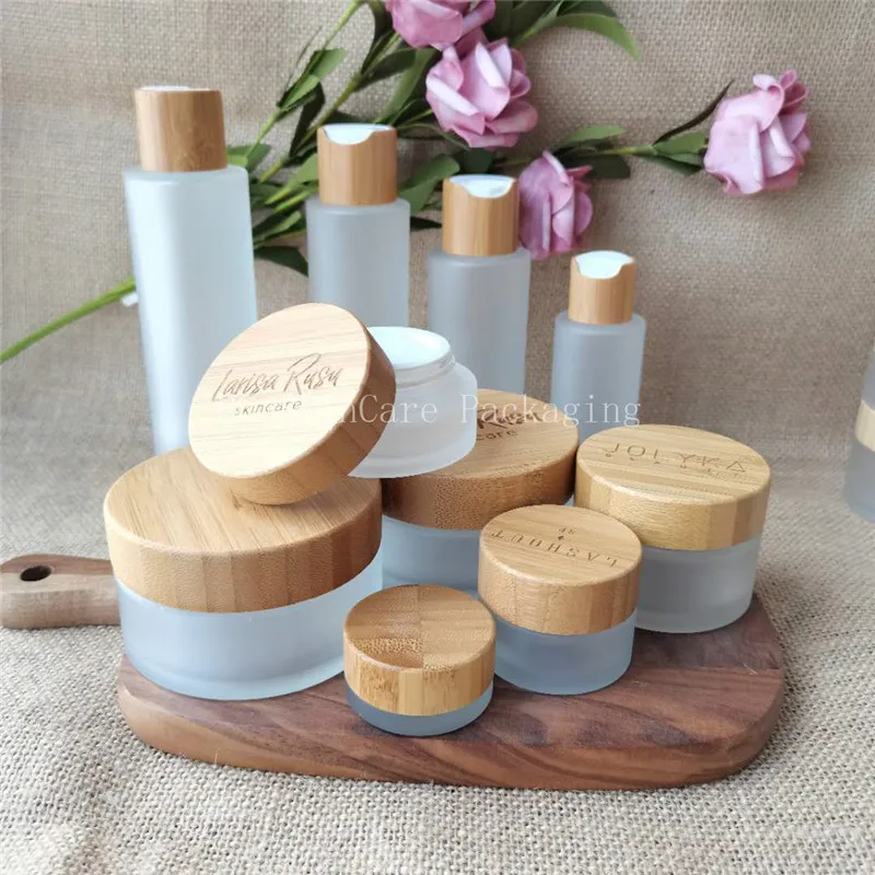 

Wholesale cosmetic packing jar 5g 15g 30g 50g 100g 200g round bamboo wood facial cream jar body scrub butter glass container