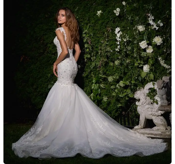 Abiti da sposa con applicazioni di cristallo in rilievo abiti da sposa a sirena bianchi accedi Backless See Through Illusion abito elegante