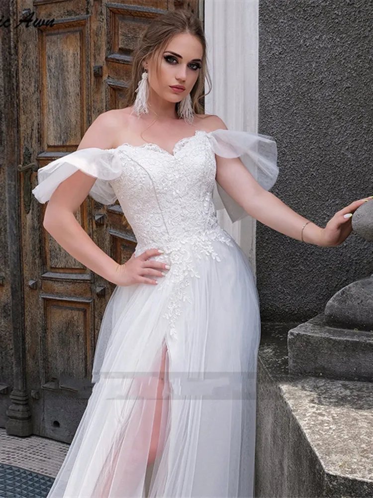 Sweetheart abito da sposa bianco Appliques di pizzo alto spaccato Organza Cap maniche abito da sposa lungo fino al pavimento Robe De Mariee nuovo arriva