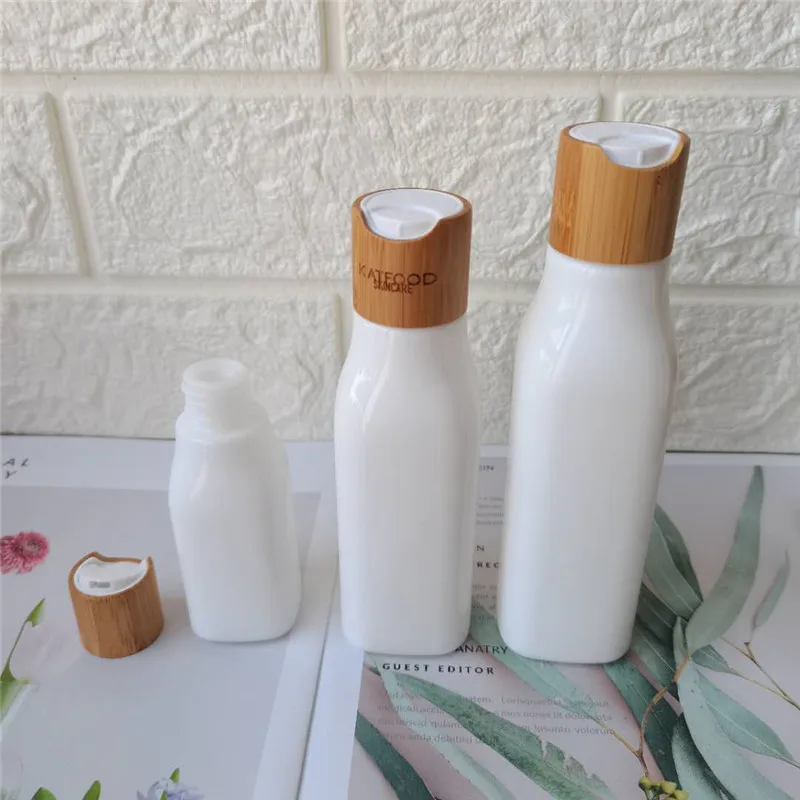 

Travel Liquid Containers White Porcelain Cosmetic Bottle Square Glass Bottle with Bamboo Disc Cap 40ml 100ml 120ml