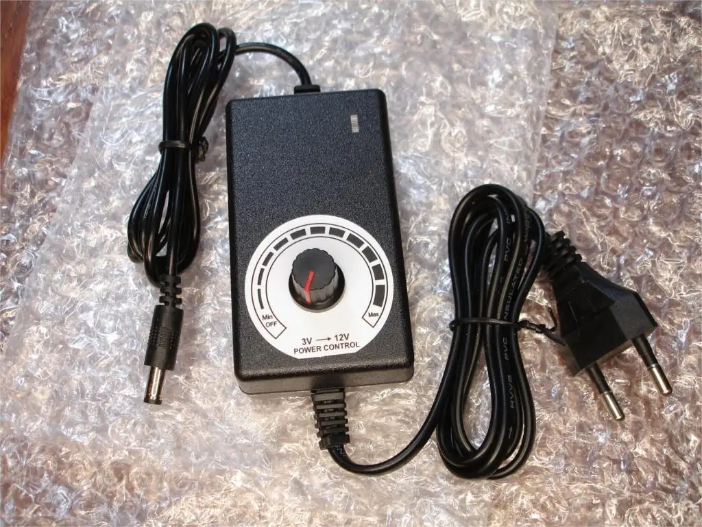 Adattatore universale regolabile da ca a cc 3-12V adattatore di alimentazione regolato in tensione 100-220V per telecamera CCTV striscia luminosa a LED