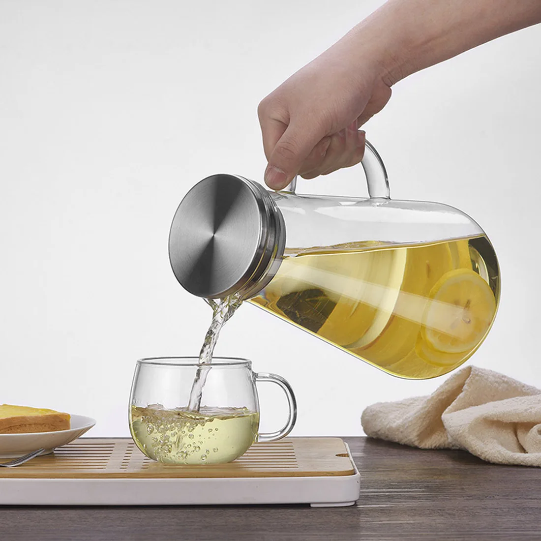 Jarra de agua de vidrio resistente al calor para el hogar con tapa de acero inoxidable con pico de pato, olla de jugo casera de gran capacidad con mango, nueva