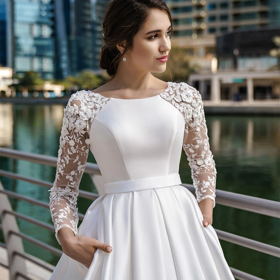 Elegante con abito da sposa musulmano in raso tascabile maniche lunghe scollo tondo Applique in pizzo abiti da sposa A-line Vestido De Novia