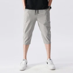 Pantalon d'été en soie glacée pour hommes, coupe ajustée, petit pied, sport décontracté, séchage rapide, short élastique à 7 points, Version coréenne