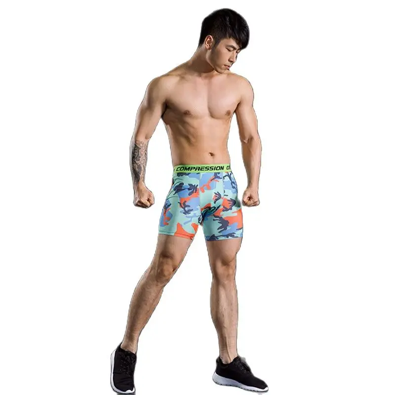 Mężczyźni kompresja warstwa podstawowa sportowe obcisłe szorty siłownia jazda na rowerze legginsy spodnie sportowe Skinny Running spodnie moro