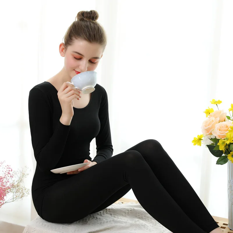 Autumn and winter women\'s body shaping solid color round neck low collar thermal underwear set body autumn clothing long pants