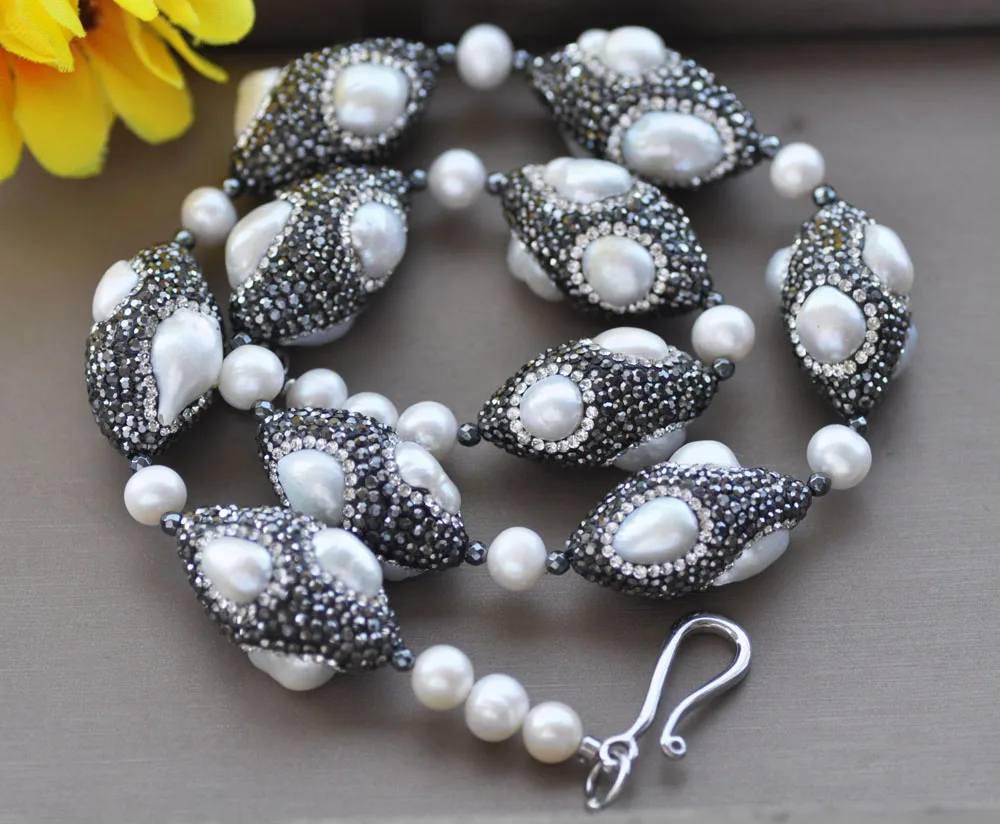 

Z10955 19" 30mm White Pearl Shuttle CZ Bead Necklace