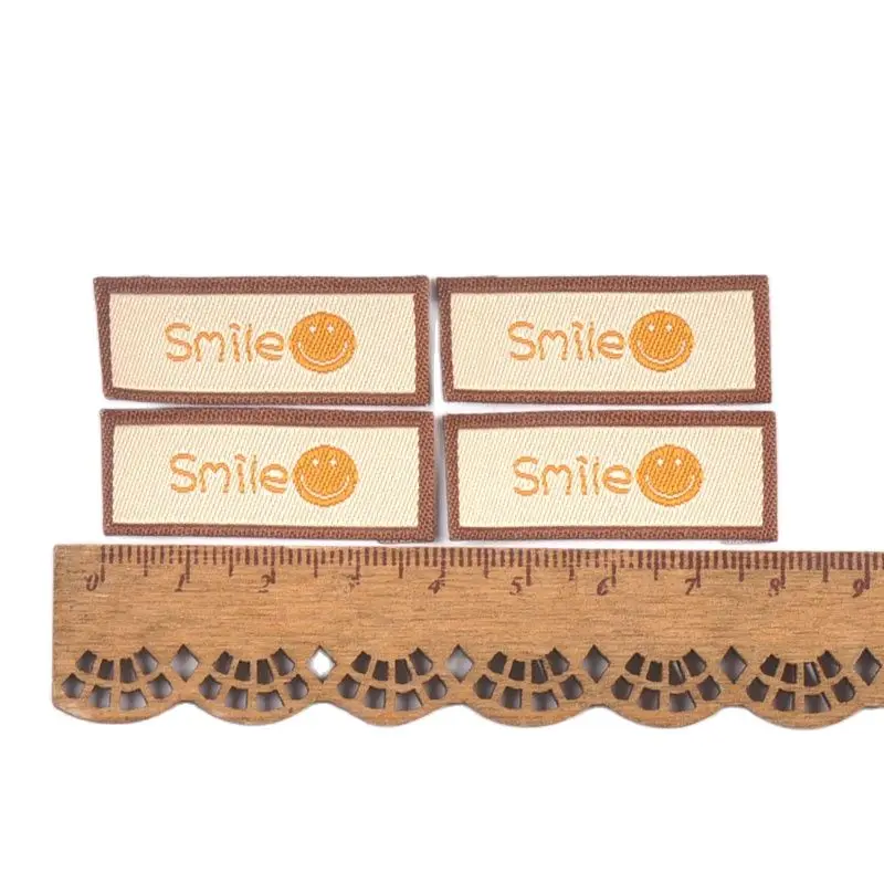 50Pcs/Lot Cartoon Embroidery Washable Care Labels For Clothing Sewing Accessories Bags Smlie Face Tags Garment DIY Crafts c3207